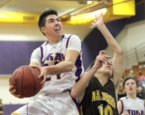 Boys basketball: Tigers use big third quarter to roll past Delta Kings 