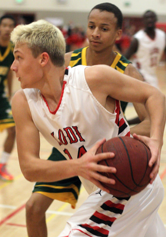 Boys basketball: Benjamin Simi, Flames dominate Yellowjackets 