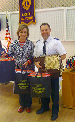 Lodi Rag Quilters present quilts for Hope Harbor at Lodi Lion’s Club meeting