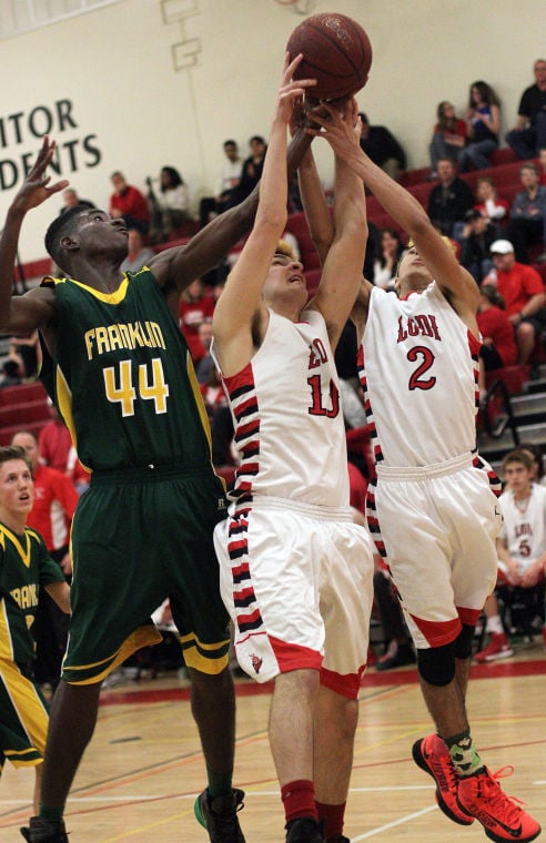 Boys basketball: Benjamin Simi, Flames dominate Yellowjackets 