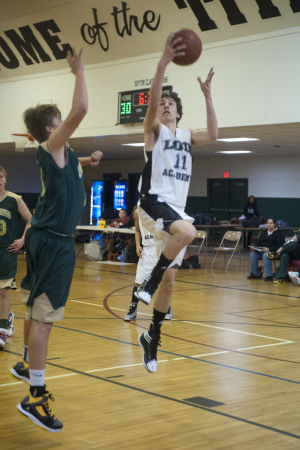 Boys basketball: Titans rout Eagles 