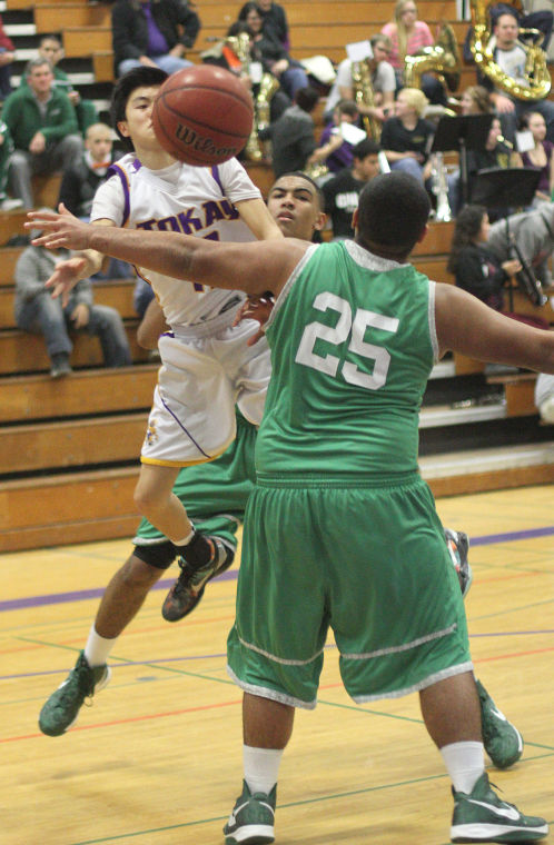 Boys basketball: Tigers hang tough for a half, but Rams pull away 