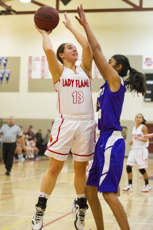 Girls basketball: Flames hold off Tigers’ late charge in thrilling finish 