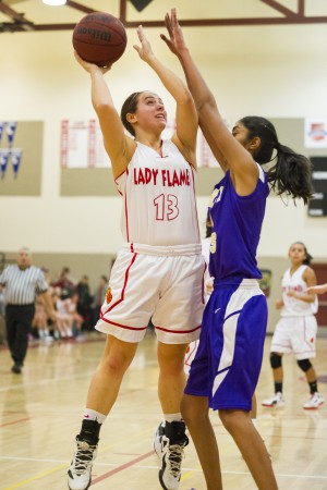 Girls basketball: Flames hold off Tigers’ late charge in thrilling finish 