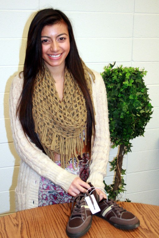 Brianna Watt collects shoes for family shelter