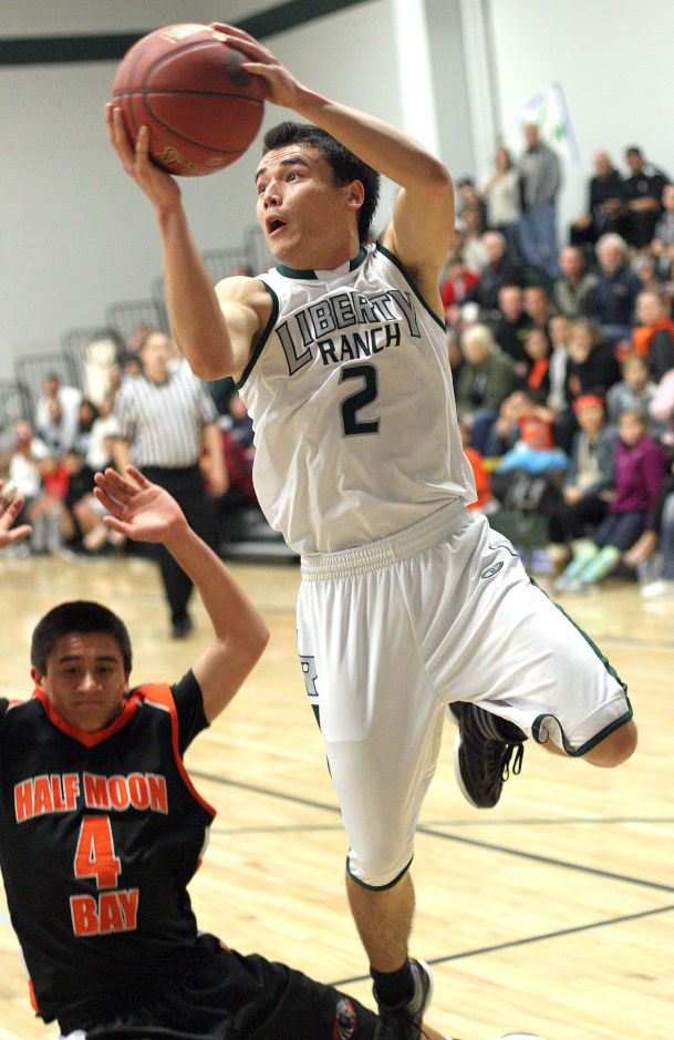 Boys basketball: Hawks hold off Cougars and make history