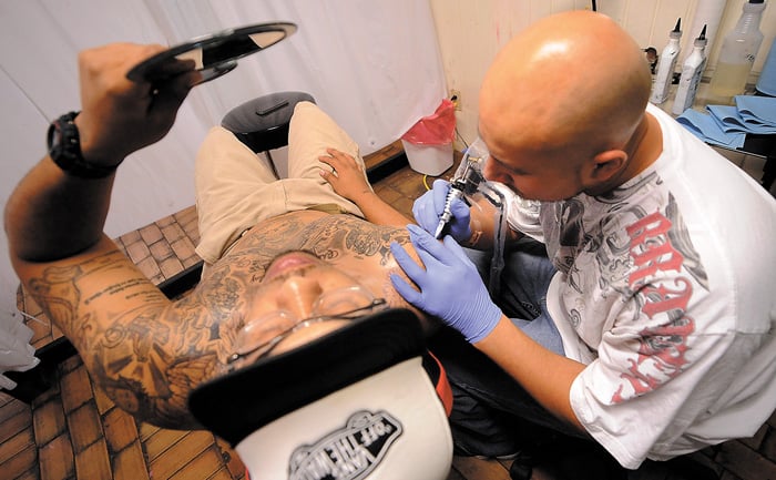 Pretty in Ink artist Luis Castillo of Lufkin tattoos Cameron Davis in the