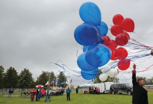 Nation’s War Dead Honored Amid Raindrops