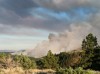 Smoke rises from the Skibstad fire