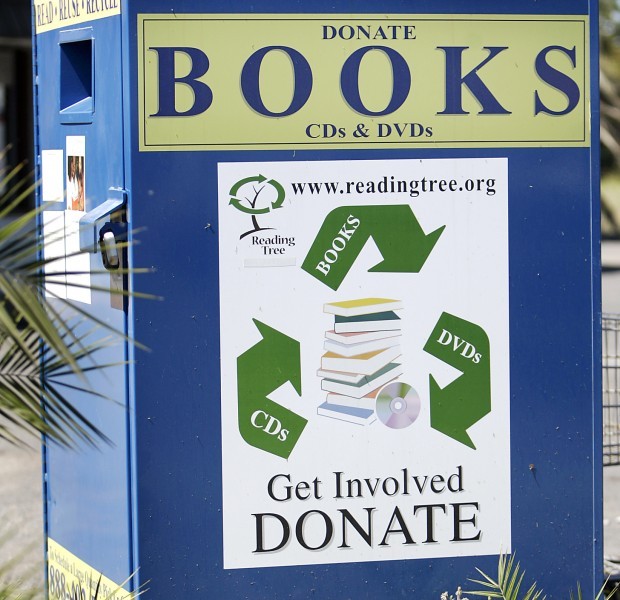 Rival boxes collect books for profit and donation