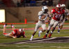 <p>Utah State's Bruce Natson runs back a punt for a 65-yard touchdown in the first half of an NCAA college football game against New Mexico, Saturday, Oct. 19, 2013, at University Stadium in Albuquerque, N.M. Utah State won 45-10. (AP Photo/Eric Draper)</p>
