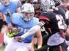 <p>Sky View's Isaac Herrmann carries the ball as Murray's Taylor Litson defends Friday in Smithfield. (Eli Lucero/Herald Journal)</p>