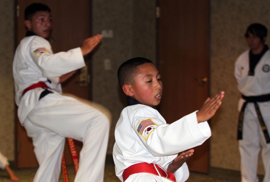 Brothers earn taekwondo black belts; 14 more advance - Nogales International