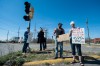 Demonstrators protest postal cutbacks