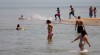 Warm weather, sunshine brings people to water's edge