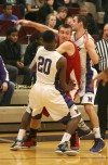 Portage's Jacob Bearss is sandwiched between Merrillville's B.J. Jenkins and Jake Raspopovich during Friday night's game.