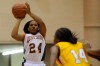 West Side senior guard Narshanda Malone shoots past