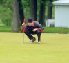 Chesterton's Josh Kelly lines up for his putt on No. 18 green Friday afternoon at the Uebele Invitational.