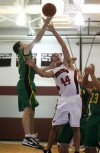 Morgan Townships' Jacob Kemp, left tries to shoot over Washington Township's Bobby Ross