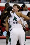 Notre Dame coach Muffet McGraw hugs Skylar Diggins