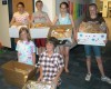 Storm can't deter families from sharing loaves with shelter