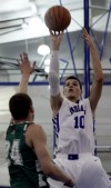 Lake Central's Mike Miklusak shoots over Valparaiso's Quentin Palmer