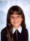 Reading earns third-grader a trophy and library some cash