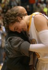 Ryan Broekhoff gets a hug from Valparaiso V.P. Michael Joseph after the Crusaders defeated Wright State in the Horizon League men's basketball tournament championship game.