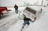 Road conditions improving, but police still urging caution