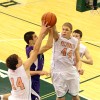 Valparaiso's Brody Wilson, left, and John Mosser combine to stop a shot attempt by Merrillville's Jake Raspopovich on Friday.