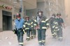 Firefighters on a Dusty Street