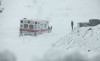 Dozens dead, millions without power in Sandy's wake