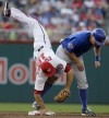 Baker's wild error helps Nationals top Cubs