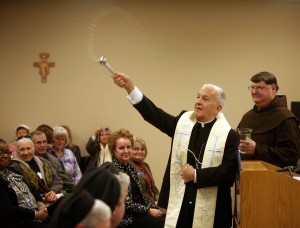 Gary bishop blasts health care law as attack on religious freedom