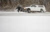 Road conditions improving, but police still urging caution