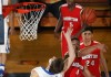 Lake Central's Chris Tuskan, left, and Morton's Mark Snorton go up for a rebound Friday.