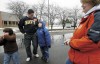 Navy serviceman returns from Middle East, greets son at school