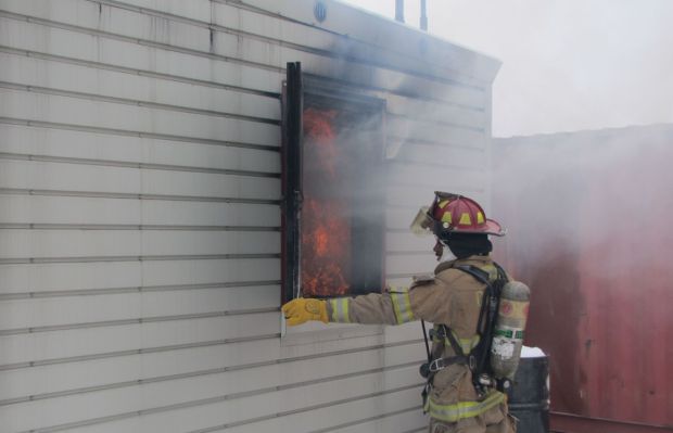 Local fire department trainers learn about live fire training