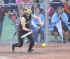 Griffith's Alexis Atkinson throws down a bunt Tuesday evening during the Class 3A Regional championship at Hanover Central.