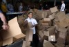 Volunteers pack Care Boxes for region families