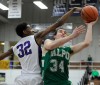 Valparaiso's Quentin Palmer goes up for a layup against Merrillville's Zoran Talley on Saturday.