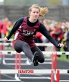 River Forest's Bryanna Kaehler clears a hurdle