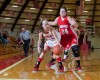 Munster's Natalie Vellutini, left, is pressured by Crown Point's Taylor Equihua