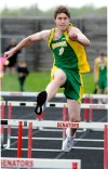 Brad Mcginley of Morgan Twp. leaps the hurdles
