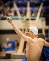Highland's Stephen Castillo acknowledges the fans winning the consolation heat of the 50 free in Saturday's state finals.