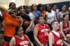 Wheelchair basketball players exhibit their skill for youngsters