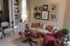 Warmth and worldly flair define a vast riverside estate