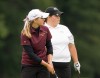 Chesterton's Kelly Grassel putts with Valparaiso golfer Harley Dubsky watching