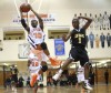 West Side's Denzell Casson, Lew Wallace's Devin Harris