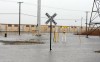 Flooded roads, swollen rivers, lightning strikes as storms sock region